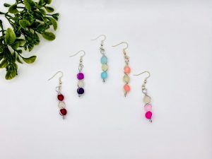 Collection of handmade colorful beaded dangle earrings