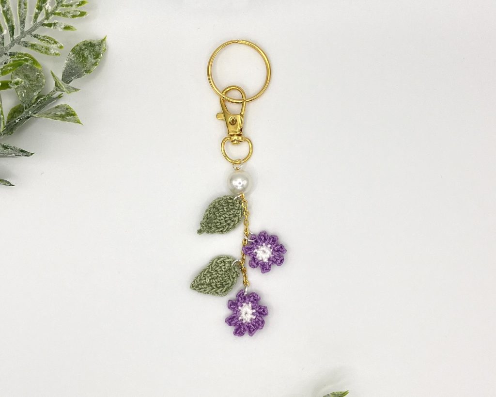 Purple flower bag charm