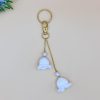 IMG_1206 Lily of the valley bag charm on a gold chain with snap hook and key ring, and a gold pearl