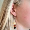 IMG_7905_Original_Original Woman wearing wood bead earrings