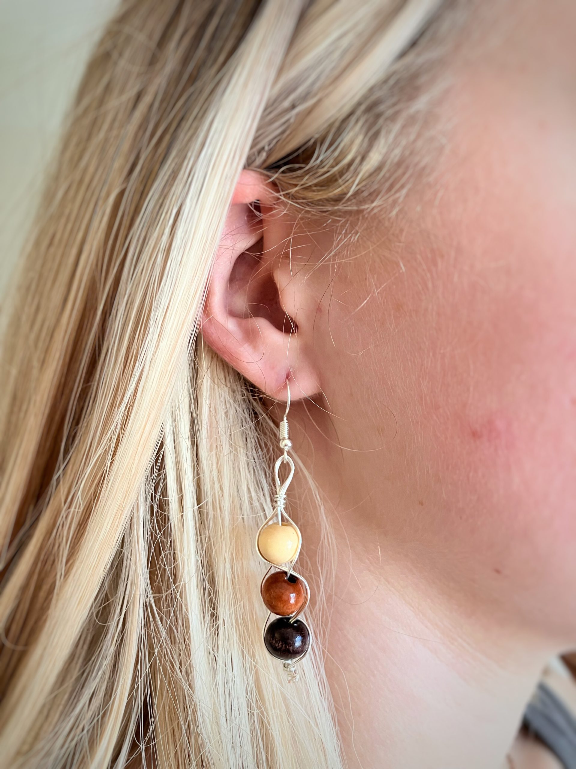 IMG_7905_Original_Original Woman wearing wood bead earrings