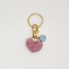 IMG_2993 Handmade pink crochet heart, on a gold key ring, with a blue and gold letter charm