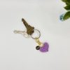 IMG_2998 Hand crocheted lavender heart keychain, with personalized black and gold letter charm, on a keyring with keys