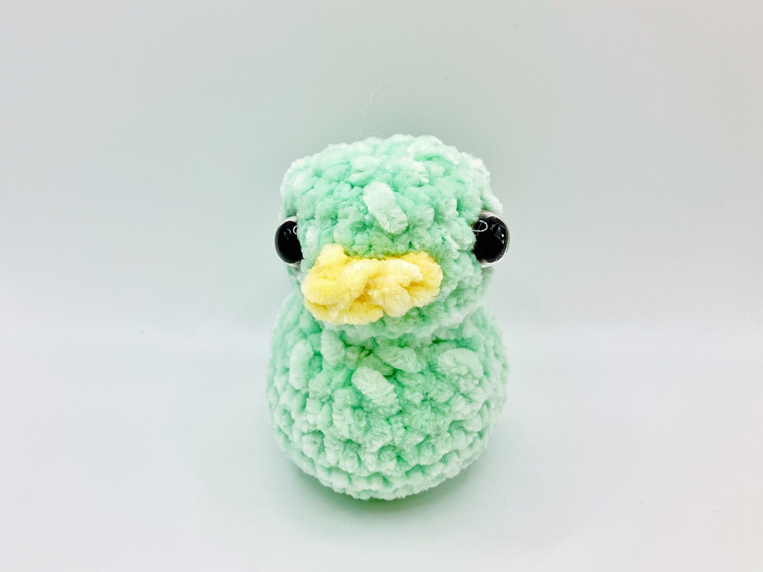Front view of a crochet duck plushie