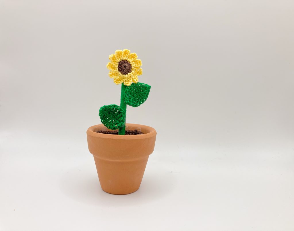 Micro crochet sunflower in real clay pot